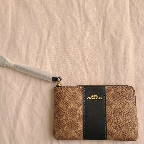Coach Handbags - Coach wristlet (never used)